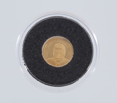 l'image d'une pièce d'or sur laquelle figure le portrait d'un homme