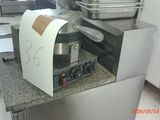 a machine that is sitting on a counter in a kitchen