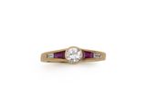 a diamond and ruby ring with baguets