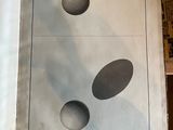 an open book with a picture of three eggs on it