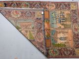 an old rug with a picture of a city on it