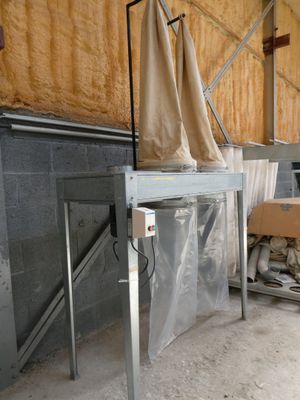 an image of a room with a table and a chair