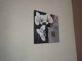 a picture of a painting on the wall of a room