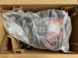 a cardboard box with a cell phone inside of it