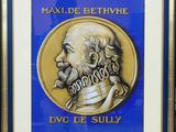 portrait, dans un cadre bleu et or, d'un homme barbu et moustachu