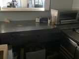 an image of a kitchen with a sink and a microwave