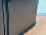 an image of a black desk with a glass top