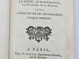 an old book with a black and white image of an eagle on it