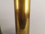 pair of brass vases on a white background