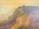 un tableau représentant une vache paissant sur une colline
