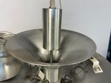 a metal object that is sitting on top of a table