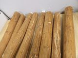 a lot of wood sticks that are on a table