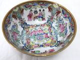 a bowl with a design on it on a white surface