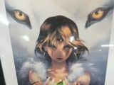 framed picture of a young girl holding an apple in front of a wolf ' s eyes