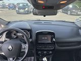 a dashboard view of a car in a parking lot
