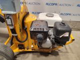 a small machine that is sitting on the ground