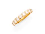 une bague sertie d'un diamant et de dix-huit pierres, signée Van Cleef