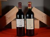 two bottles of wine sitting next to each other on a table