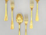 five forks and two spoons and a fork and a spoon