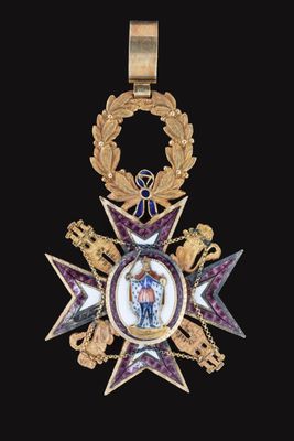 an image of a gold medal with a purple star on it
