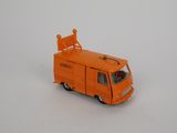 an orange toy truck that is sitting on a white surface