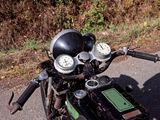 a close up of a motorcycle with a helmet on it