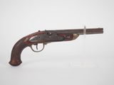 un vieux fusil avec une poignée en bois sur fond blanc