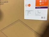 someone holding a cardboard box with a drawing of a diamond on it