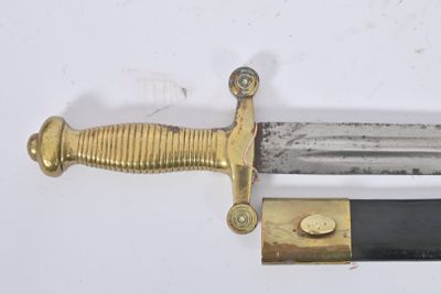 a knife that is laying on top of a table