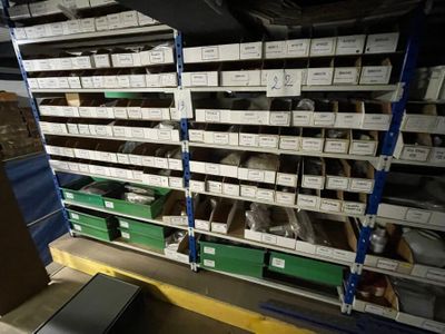 many boxes of food on the shelves in the warehouse