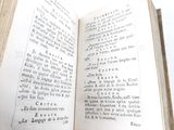 an open book that is sitting on a table