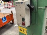 a machine that is sitting on the side of the road