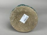 a close up view of a round object with a label on it