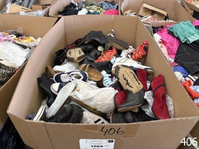 many boxes of shoes that are sitting in a store