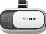 a white vr box with a black and red logo on it