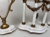 three vases that are sitting next to each other on a table