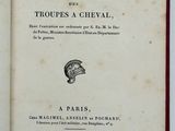 a book with a picture of a helmet on it