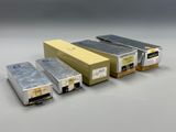 three different types of power supplies are shown on a gray surface
