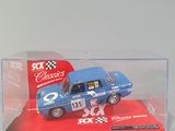 a blue toy car in a clear box on a table