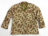 an image of a military jacket with a camouflage pattern on it