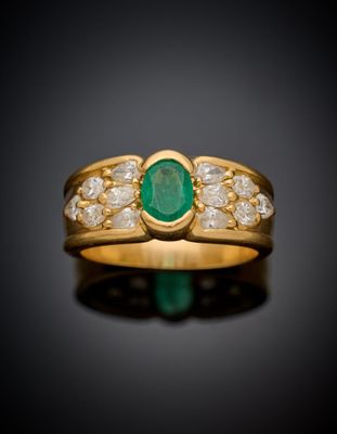 an emerald and diamond ring