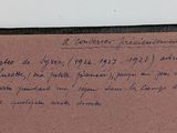a piece of paper with writing on it sitting on a table
