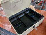 an open suitcase sitting on a table in a room
