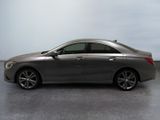 the mercedes cla is parked on the concrete floor