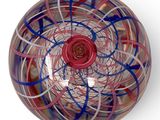 a glass bowl with a red and blue design on it
