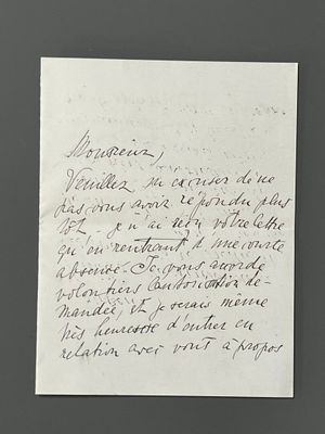 une vieille lettre écrite à la main sur un morceau de papier avec une écriture dessus