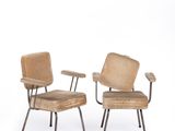 pair of chairs with armrests and armrests in the shape of a chair