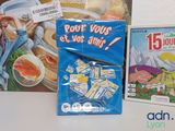 a box of food and a game on the table