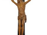 wooden crucifix with jesus on the cross on a white background