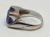 bague en argent sterling sertie d'une pierre bleue et rehaussée de diamants